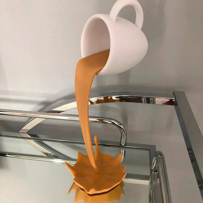 Contemporary Floating Coffee Cup Sculpture: Unique Kitchen Decor with Pouring Splash - Creative Desktop Accent - Home Fads 
